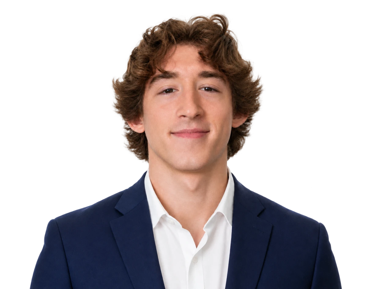 Matthew Tavares wearing a navy suit jacket